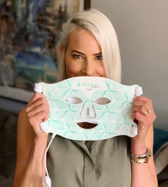GirlHoldingMaskFlat